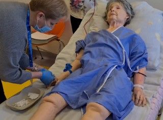 TERi™ Androgynous Geriatric Trainer, Light Skin